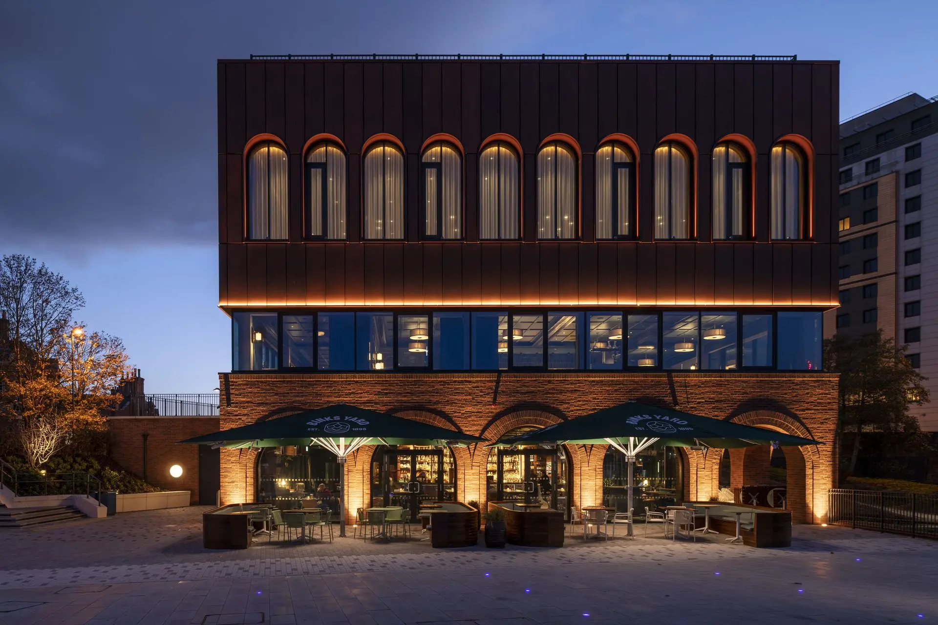Canal Turn Exterior Promenade and Red Brick Facade